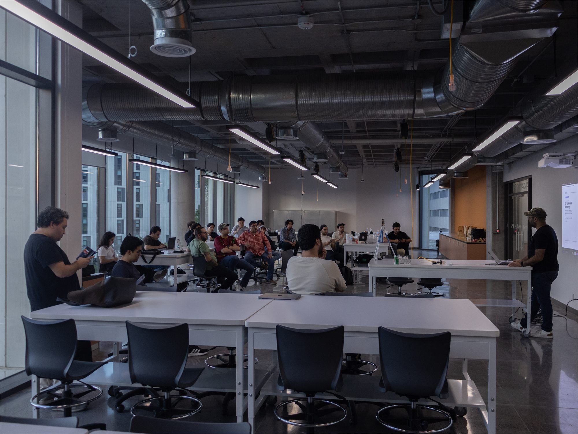A Coherence gathering: people coming together, sharing, and listening.